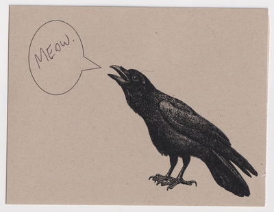 Front of postcard. Kraft paper colored postcard with a drawing of an open-mouthed crow. A speech bubble is next to the crow's mouth. The speech bubble says 