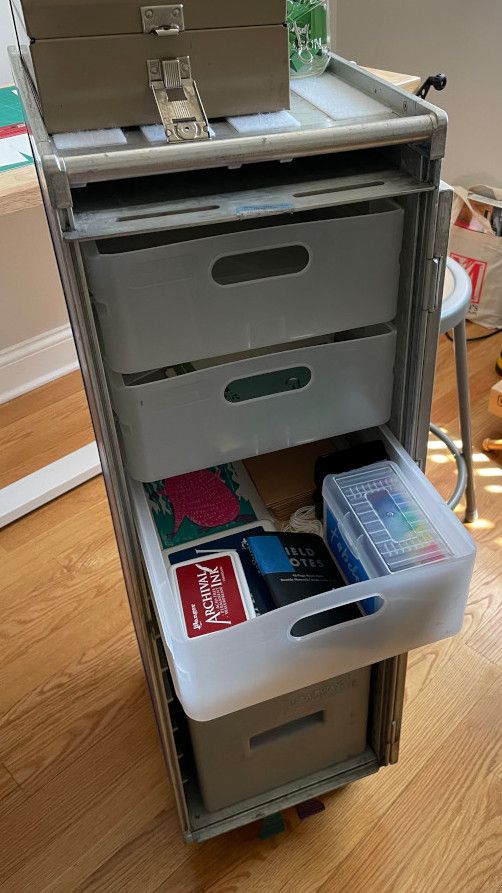Picture of airplane galley cart with door open