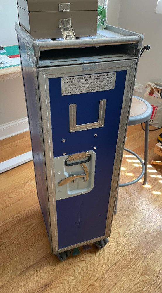 Picture of the airplane galley cart with the door closed.