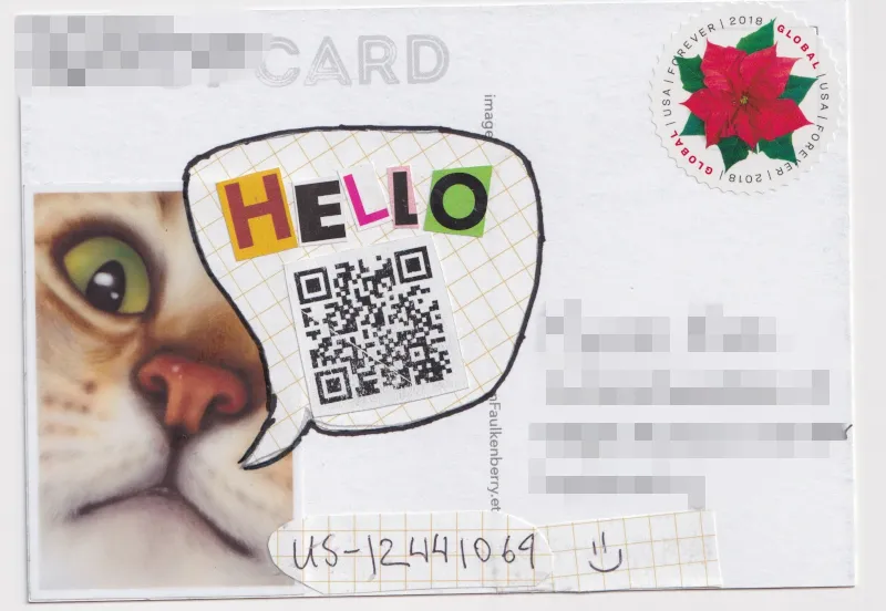 A sticker of a cat face very close up and cropped just so the nose, mouth, and one eye is visible has a speech bubble containing the word "HELLO" spelled with cut-out magazine letters and a QR code that goes to a funny YouTube video.